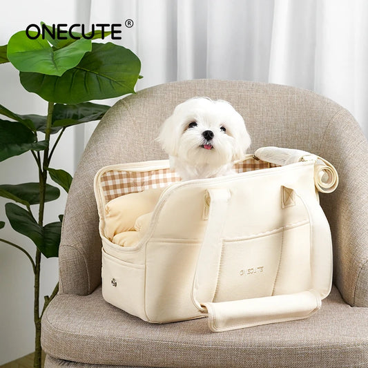 Dog carrier bag for a small dog, made from soft 100% cotton.